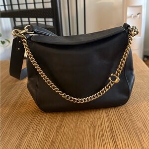 Coach Elegant Black Leather Bag with Gold Chain